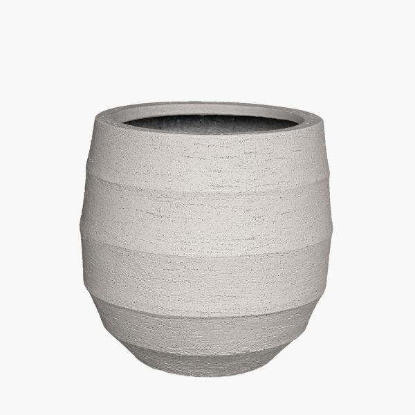 The Cove planter with carved texture and grounded form, designed for modern commercial spaces.