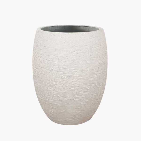 The Ember - Tall planter with artisanal texture and natural finish from the Oterra family, designed for modern commercial interiors and exteriors.