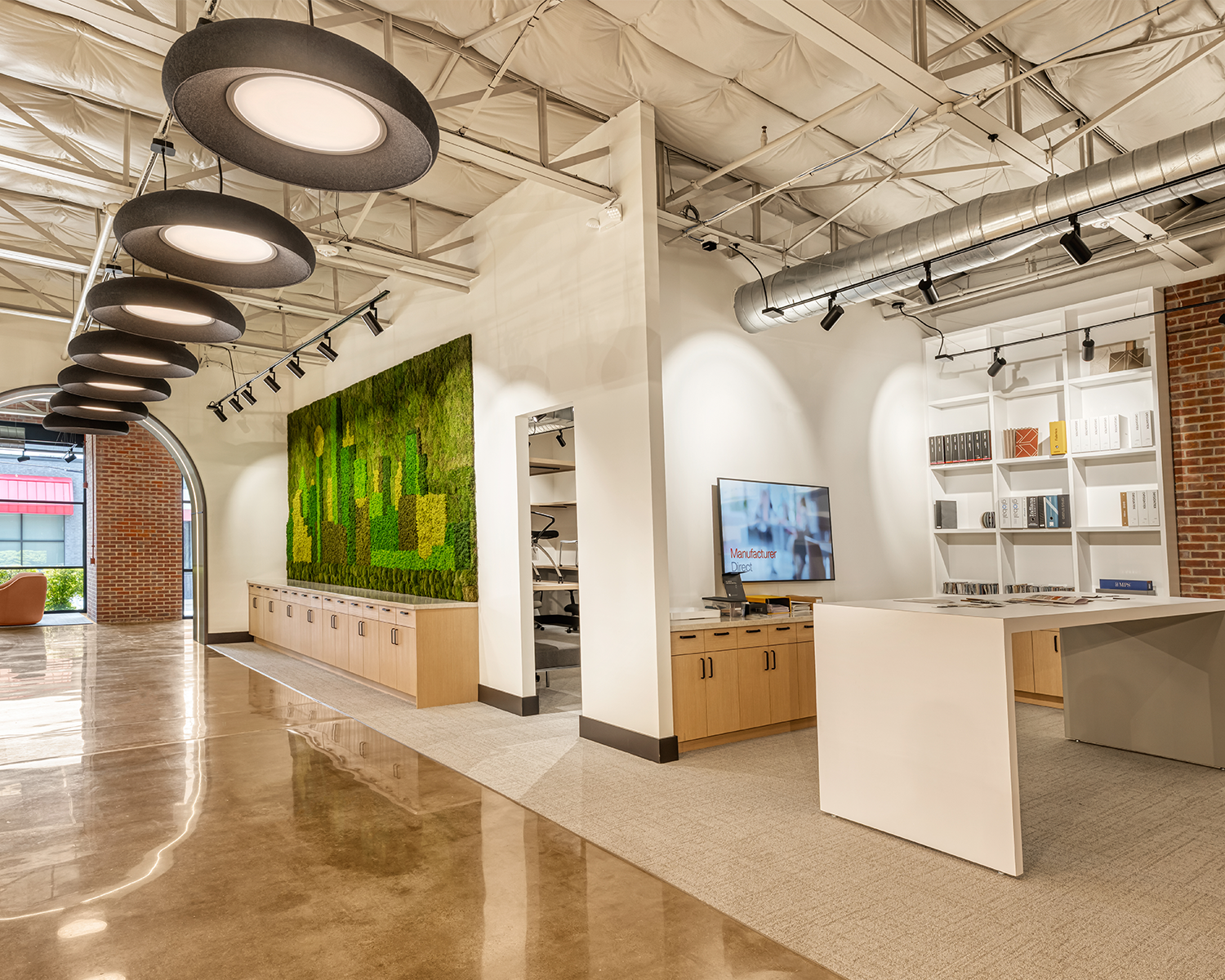 Custom preserved moss wall installation depicting Dallas skyline inside CultureSpace office.